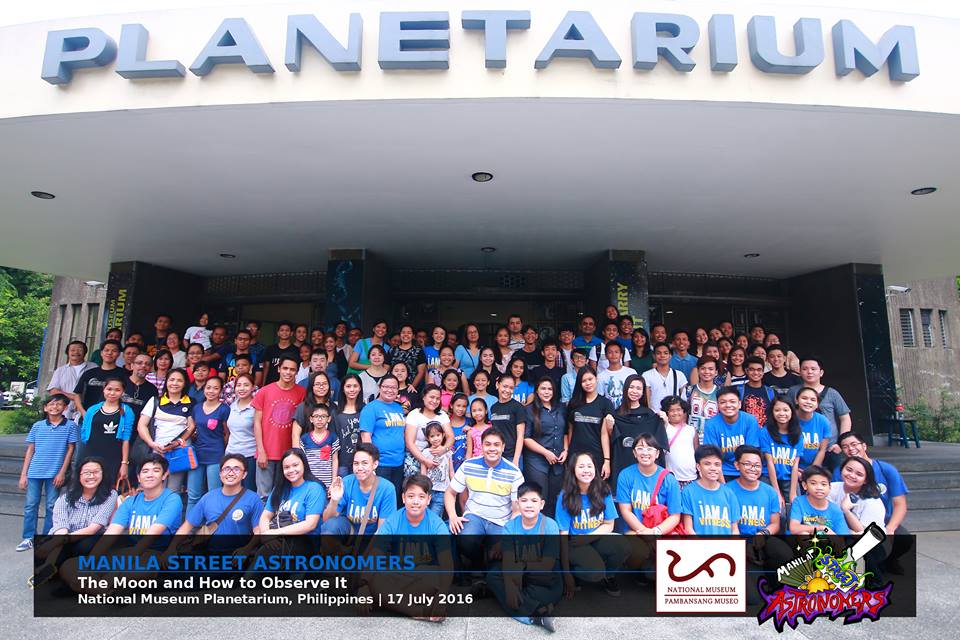 Participants pose outside the NMP