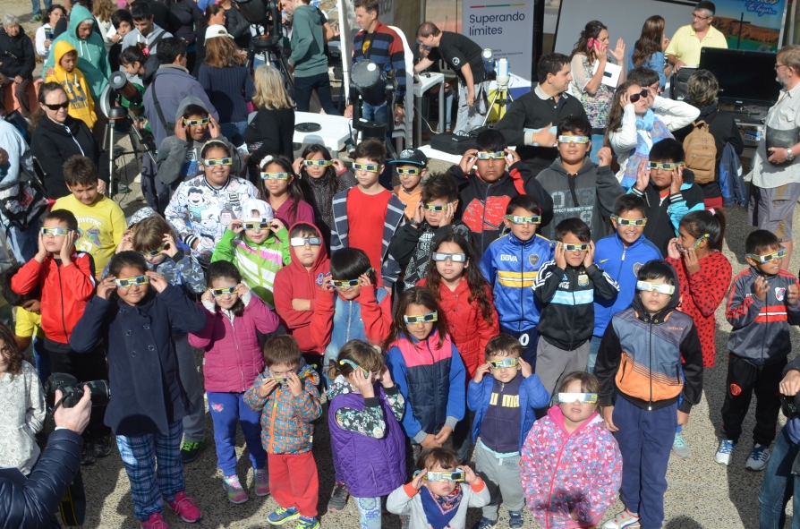 Children facing eclipse